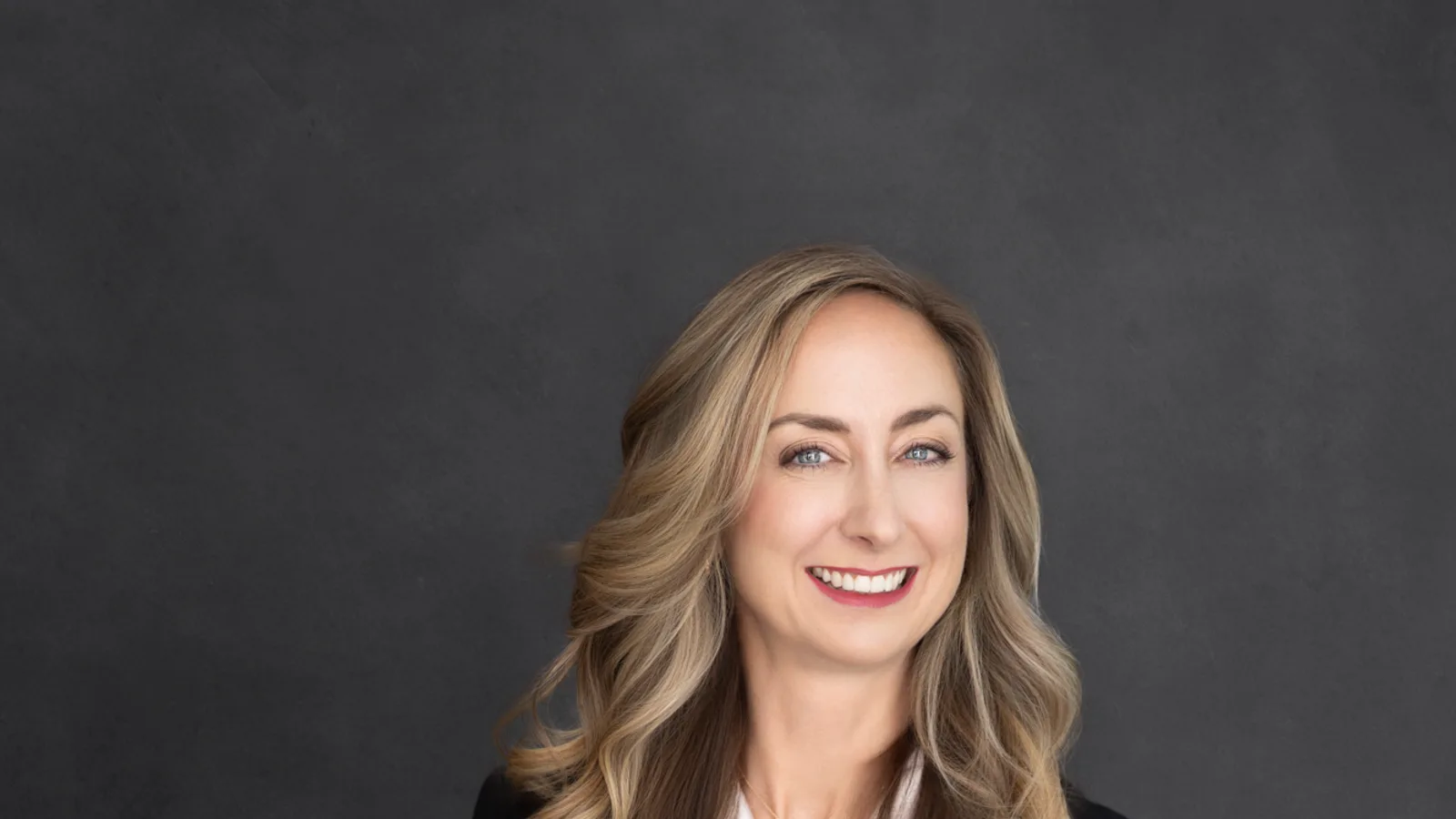 Professional headshot photographed in Arnel Gonce's Charlottesville studio