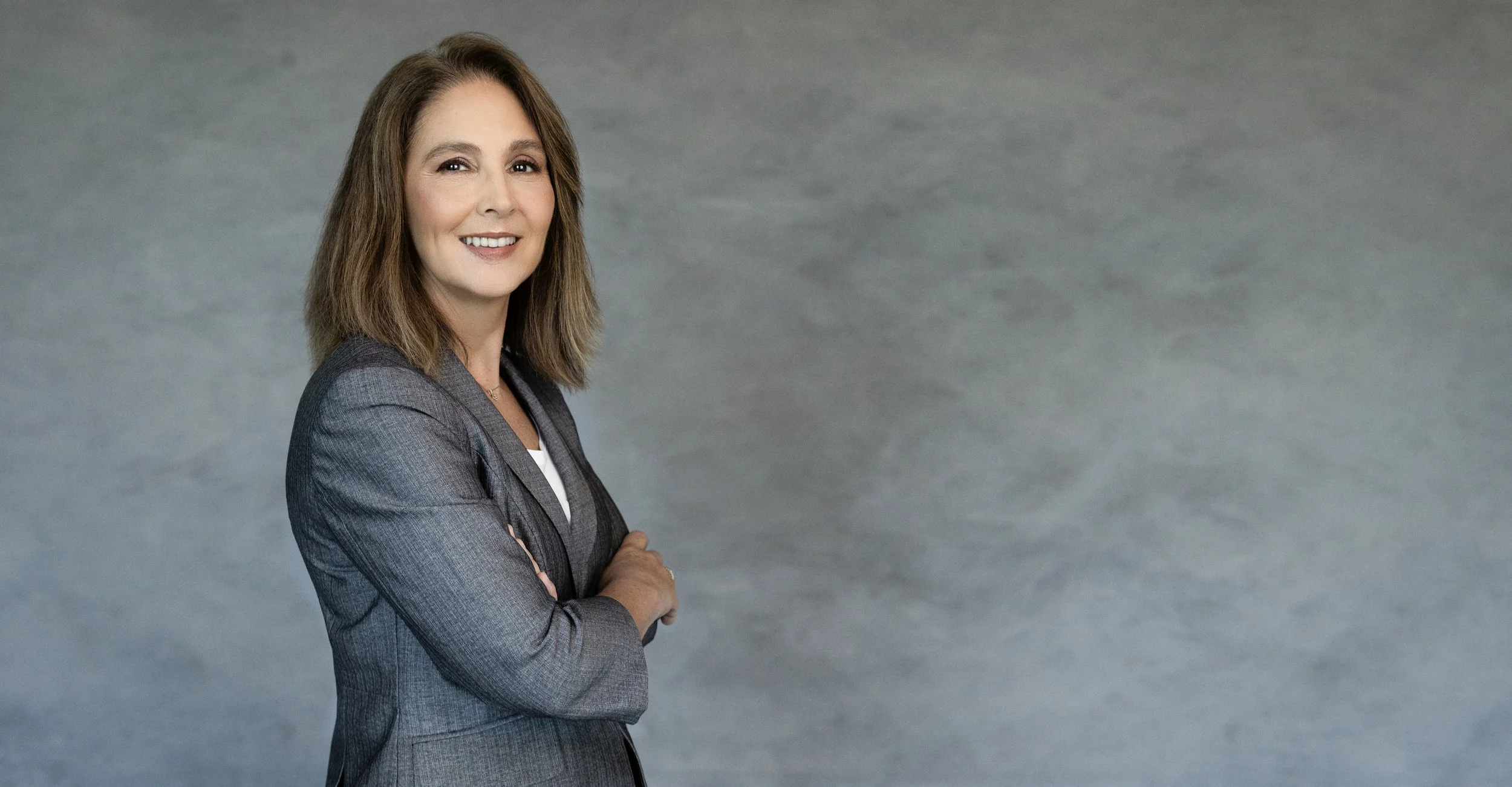Corporate headshot with warm tones
